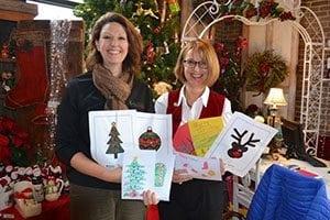 From left, Dena Eberhart, human resources manager, Royer’s Flowers, and Kathy Doran, regional service to the armed forces director, American Red Cross.