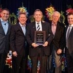 Bob Hurley, center, accepts the Tom Butler Award for “Outstanding Service and Dedication.” Also pictured: Teleflora’s Michael Martin, Jack Howard, Herman Meinders and Jeff Bennett