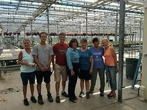 Rep. Annie Kuster (D-N.H.), center, visited D.S. Cole Growers in Loudon, New Hampshire, earlier this month. “She did a good job of me that she had many of our interests in mind, such as immigration reform,” said Doug Cole (in red T-shirt).