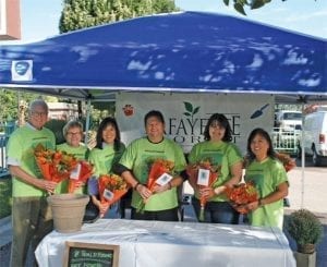 Last year in Lafayette, Colorado, DWF Wholesale Florists donated product to help the team at Lafayette Florist, Gift Shop and Garden Center offset costs. Shown: Dave and Laura Gaul of DWF, and Lori Wheat, AAF; Brian Wheat, AAF, PFCI; Jessica Beard and Sandi Yoshihara-Sniff, AAF, AIFD, of Lafayette Florist, Gift Shop and Garden Center.