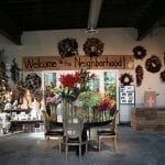 McNamara Florist is using furniture, props and color to slow customers down so they linger longer.