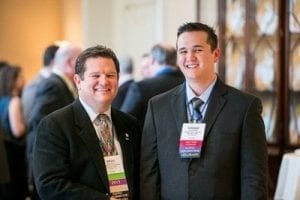 Father-son duo Brian Wheat, AAF, PFCI, and Tanner of Lafayette Florist, Gift Shop & Garden Center in Lafayette, Colorado, at a networking event during CAD 2015.