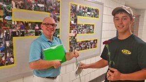 Erick Birkenberger, who teaches ornamental horticulture at Nonnewaug High School, makes Petal It Forward part of his lesson plans. The 25 students handing out 400 carnations at their school